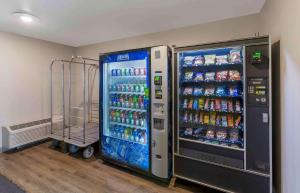 a vending machine with soda and drinks in a room at Extended Stay America Select Suites - Cleveland - Avon in Avon