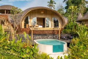 Bazén v ubytování Jungleight Bali nebo v jeho okolí
