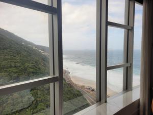 a view of the ocean from a window at Hotel Nacional in Rio de Janeiro