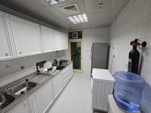 Kuchyň nebo kuchyňský kout v ubytování Oasis Hostel