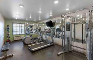 a gym with cardio equipment in a room at Extended Stay America Suites - Denver - Airport in Aurora