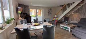 Posezení v ubytování Premiumferienhaus Prana