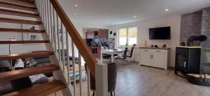 TV a/nebo společenská místnost v ubytování Premiumferienhaus Prana + 20 fotografií