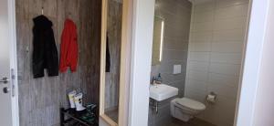 Koupelna v ubytování Premiumferienhaus Prana