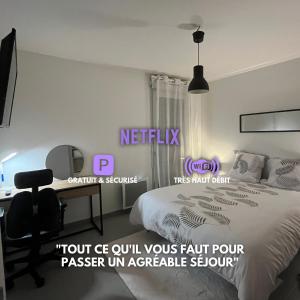 a bedroom with a bed and a desk with a computer at Calm in Tours - Appartement T2 in Tours