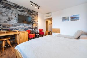Postel nebo postele na pokoji v ubytování B&B Villa Sumrak Plitvica Rooms