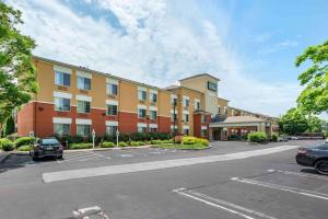a large building with a parking lot in front of it at Extended Stay America Suites - Philadelphia - King of Prussia in King of Prussia