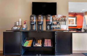 a shelf with some food and drinks on it at Extended Stay America Suites - Pittsburgh - Airport in Imperial