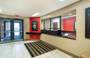 a lobby of a fast food restaurant with a laptop at Extended Stay America Suites - Columbia - Columbia Parkway in Columbia
