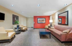 a waiting room with couches and chairs in a hospital at Extended Stay America Suites - Cincinnati - Fairfield in Fairfield