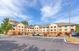 an empty parking lot in front of a large building at Extended Stay America Suites - Washington, DC - Landover in Largo