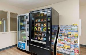 a vending machine filled with drinks and soda at Extended Stay America Select Suites - Orlando - Maitland - 1760 Pembrook Dr in Orlando