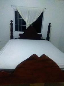 En eller flere senge i et værelse på Pinevalley Suite 4B