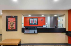 a waiting area in a hospital with a mirror at Extended Stay America Suites - St Petersburg - Clearwater - Executive Dr in Clearwater