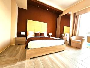 Postel nebo postele na pokoji v ubytování Trilogy Prestige - Central Premium Suites + 9 fotografií