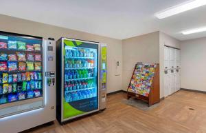 a convenience store with a soda vending machine in a room at Extended Stay America Premier Suites - Miami - Coral Gables in Miami