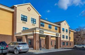 a building with cars parked in front of it at Extended Stay America Suites - Boston - Braintree in Braintree