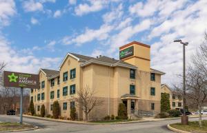 a hotel building with a sign in front of it at Extended Stay America Suites - Boston - Tewksbury in Tewksbury