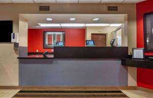 a lobby of a hospital with a reception counter at Extended Stay America Suites - Edison - Raritan Center in Edison