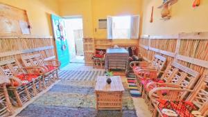 Oleskelutila majoituspaikassa هوستل أجبناخ إنشالي Hostel Agbenakh Inshaly