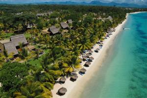 an aerial view of a beach with palm trees at Sand Castle Villa in Trou aux Biches