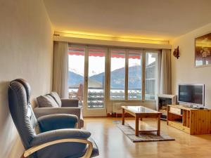 Μια τηλεόραση ή/και κέντρο ψυχαγωγίας στο Appartement l Magnifique vue l Proche Crans-Montana