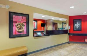 a waiting area of a hospital with red walls at Extended Stay America Suites - Washington, DC - Chantilly - Dulles South in Chantilly