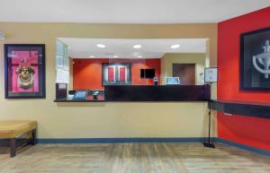 a fast food restaurant with a red wall at Extended Stay America Suites - Washington, DC - Chantilly - Dulles South in Chantilly