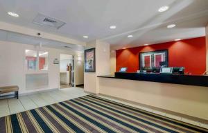 a lobby of a hotel with a cash counter at Extended Stay America Suites - Chicago - Gurnee in Gurnee