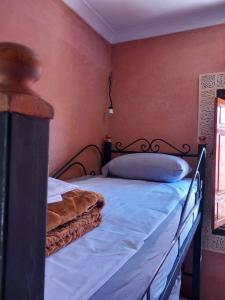 Ένα ή περισσότερα κρεβάτια σε δωμάτιο στο Riad Hostel JAD ZIAD