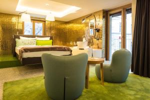Postel nebo postele na pokoji v ubytování Nala Individuellhotel + 37 fotografií