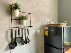 Cucina o angolo cottura di Tamaniroom- a private 1bed