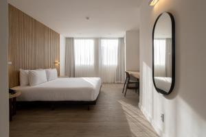 Postel nebo postele na pokoji v ubytování Sooz Hotel Collection + 37 fotografií