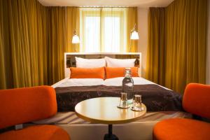 Ein Bett oder Betten in einem Zimmer der Unterkunft Nala Individuellhotel