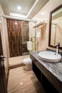 Koupelna v ubytování Hotel City Plaza & Suites