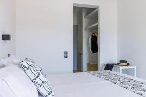 Postel nebo postele na pokoji v ubytování Aperitton Hotel
