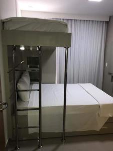 En eller flere senge i et værelse på Resort do Lago Park - Central de Reservas + 99 billeder