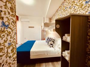 Ένα ή περισσότερα κρεβάτια σε δωμάτιο στο B&B THE SEA - Family Rooms - Free Parking