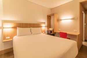 Postel nebo postele na pokoji v ubytování Hotel Moov Porto Alegre + 37 fotografií