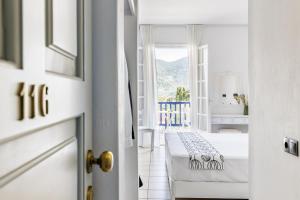 Postel nebo postele na pokoji v ubytování Aperitton Hotel