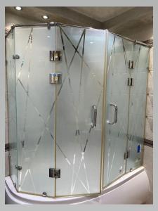 a shower with a glass door in a bathroom at المقطم,شارع 13,قطعه 331 in Cairo