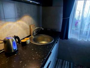 Eldhús eða eldhúskrókur á Quattro apartment +3 myndir