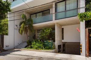 an external view of a building at Riva Condos by The Spot Rentals in Playa del Carmen