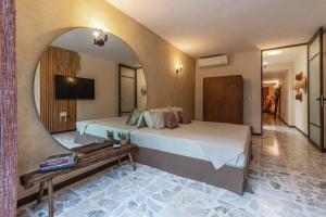 Giường trong phòng chung tại Casa Itinerante, Santa Ana / Mérida, Centro. +16 ảnh