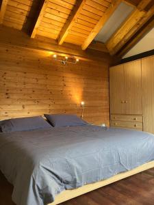 Katil atau katil-katil dalam bilik di Attico con soppalco in Val di Sole, Trentino