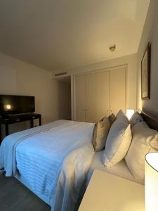 Cama o camas de una habitación en Canary Wharf 1 bed apartment