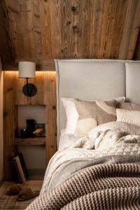 Posteľ alebo postele v izbe v ubytovaní Chalet V11 by Villa 11 Folk & Design