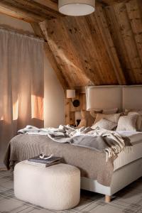Posteľ alebo postele v izbe v ubytovaní Chalet V11 by Villa 11 Folk & Design