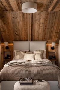 Posteľ alebo postele v izbe v ubytovaní Chalet V11 by Villa 11 Folk & Design