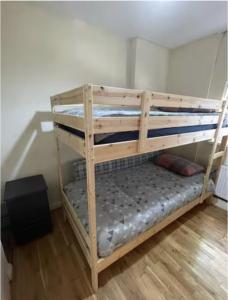 a couple of bunk beds in a room at The Comfy Cottage in Swords